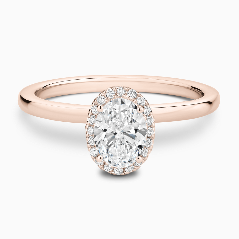 The Ecksand Iconic Diamond Halo Engagement Ring with Plain Band shown with Oval in 14k Rose Gold