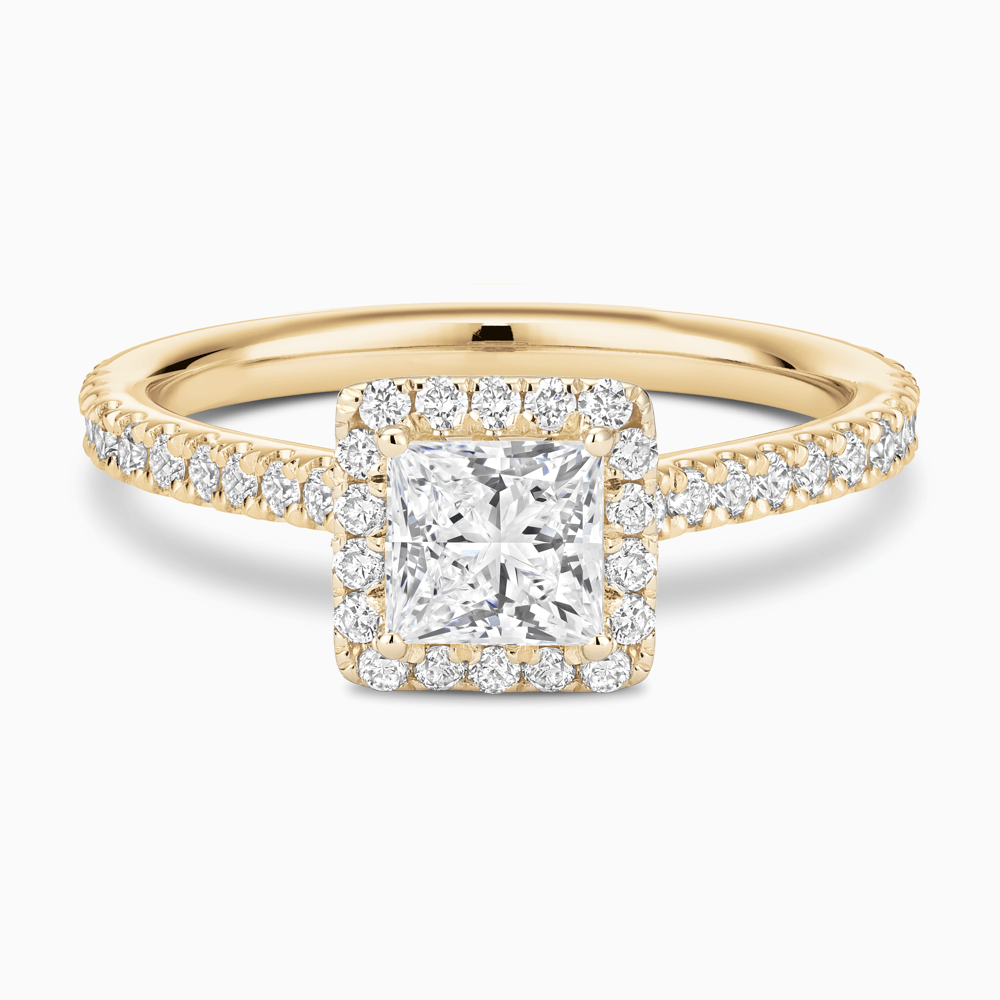 The Ecksand Iconic Diamond Engagement Ring with Halo and Diamond Pavé shown with Princess in 18k Yellow Gold