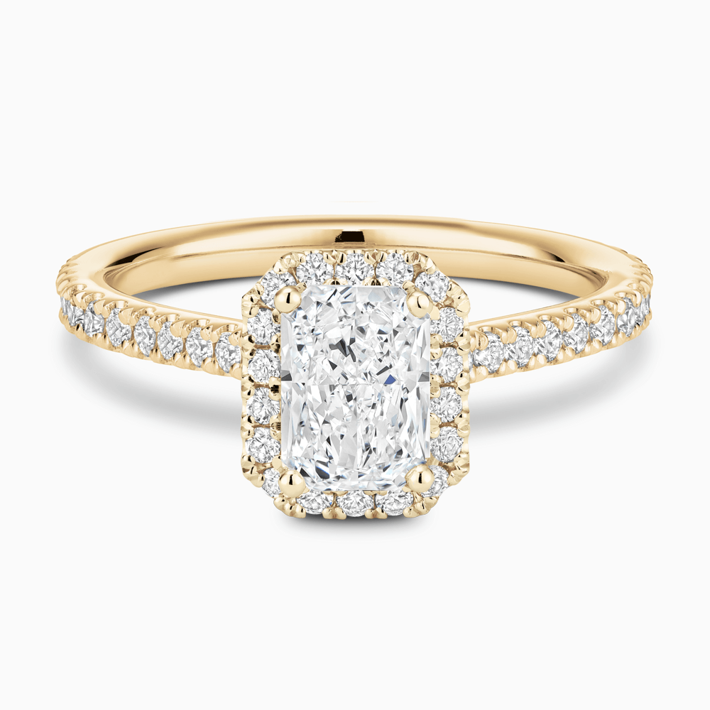 The Ecksand Iconic Diamond Engagement Ring with Halo and Diamond Pavé shown with Radiant in 18k Yellow Gold