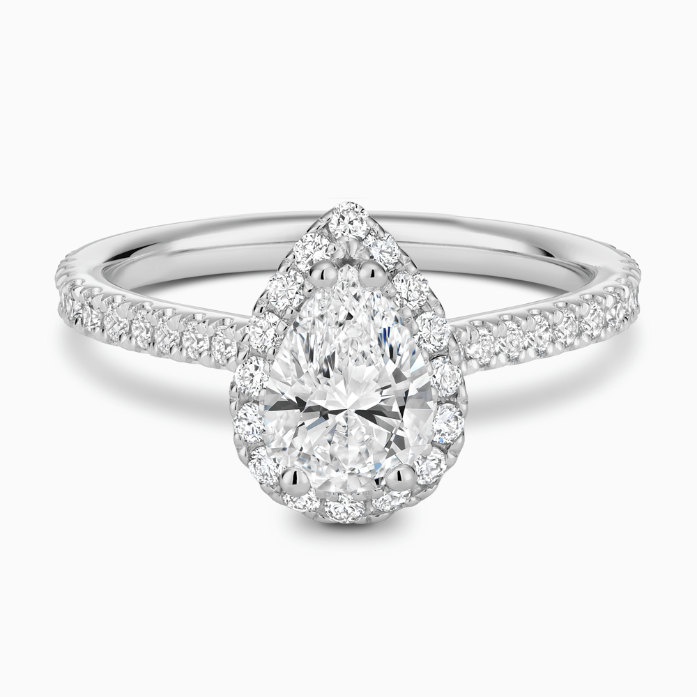 The Ecksand Iconic Diamond Engagement Ring with Halo and Diamond Pavé shown with Pear in Platinum
