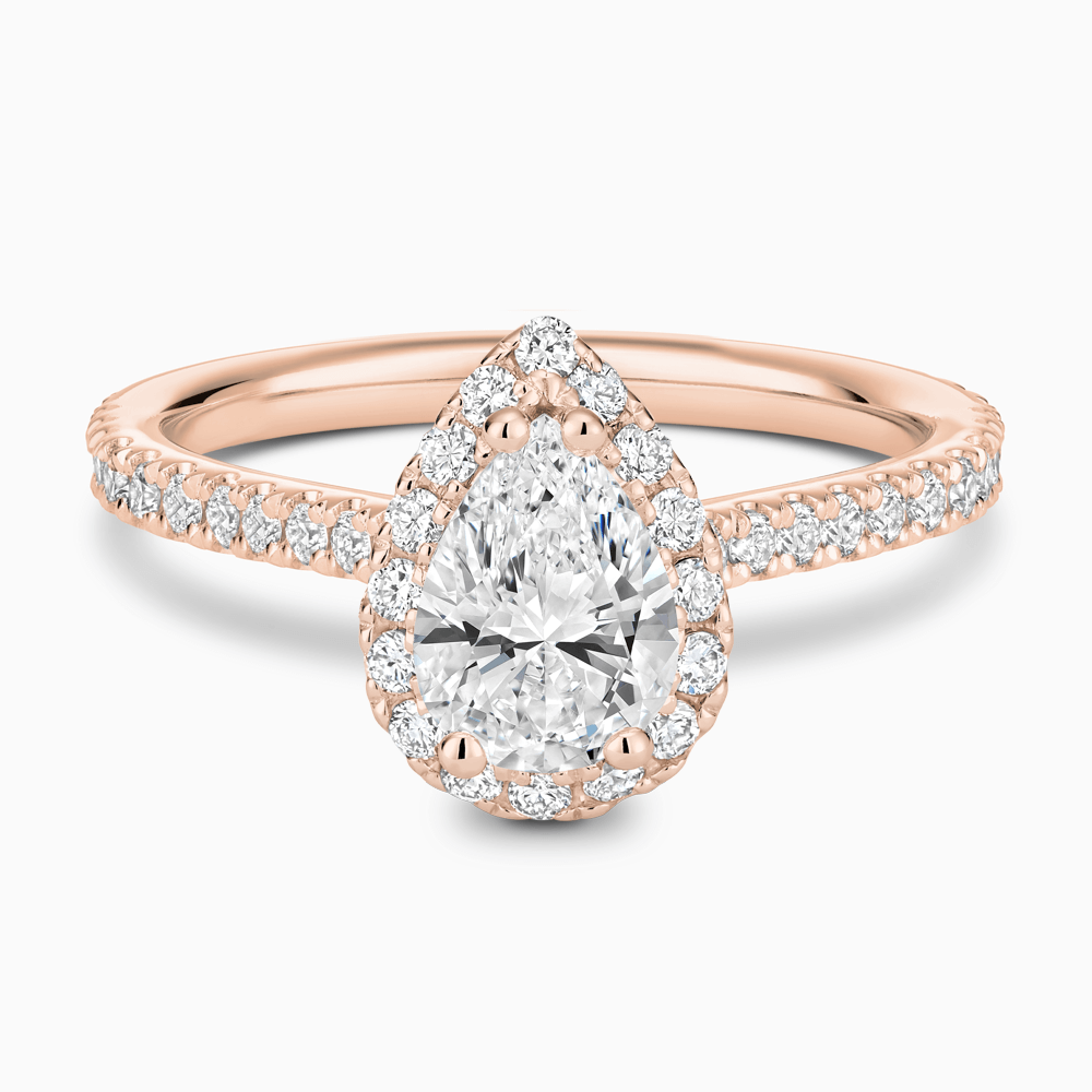 The Ecksand Iconic Diamond Engagement Ring with Halo and Diamond Pavé shown with Pear in 14k Rose Gold