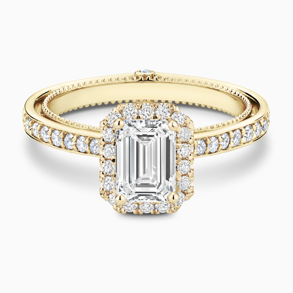 The Ecksand Diamond Halo Engagement Ring with Double Band shown with Emerald in 18k Yellow Gold