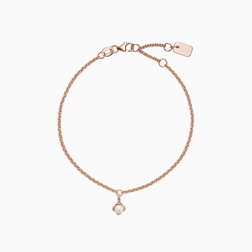 The Ecksand Mini Snowball Charm Freshwater Pearl Bracelet shown with Kid | loops at 4.75", 5.25" and 5.70" in 14k Rose Gold
