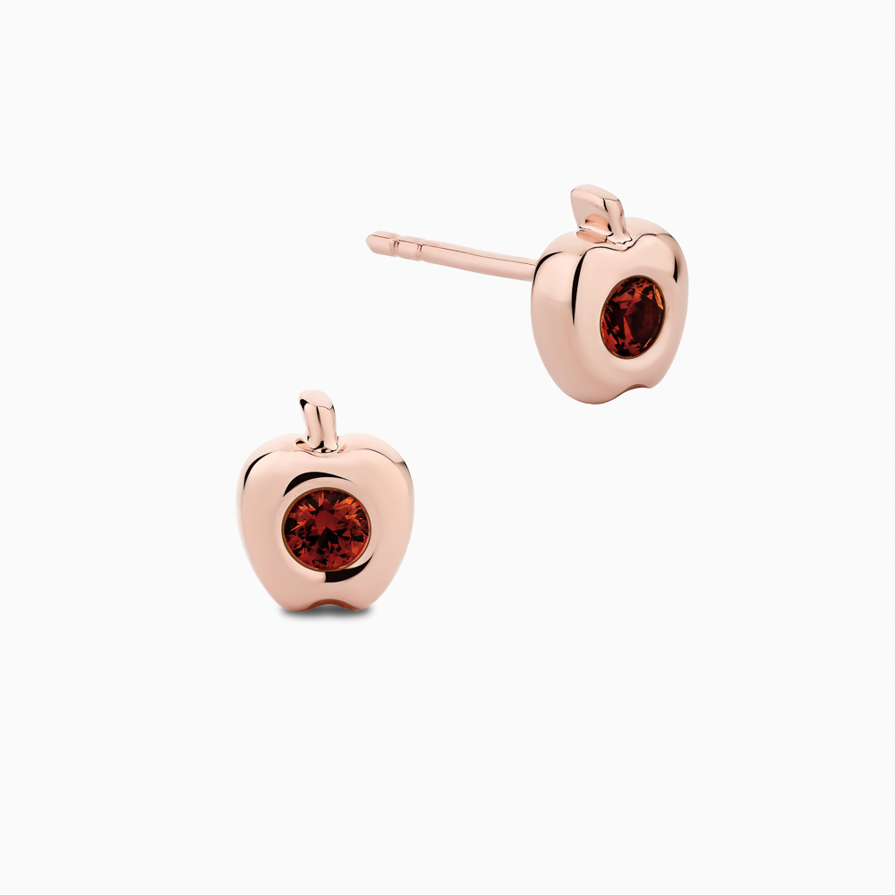 The Ecksand Apple Garnet Earrings shown with Kid | post length with 7mm silicone stopper in 14k Rose Gold