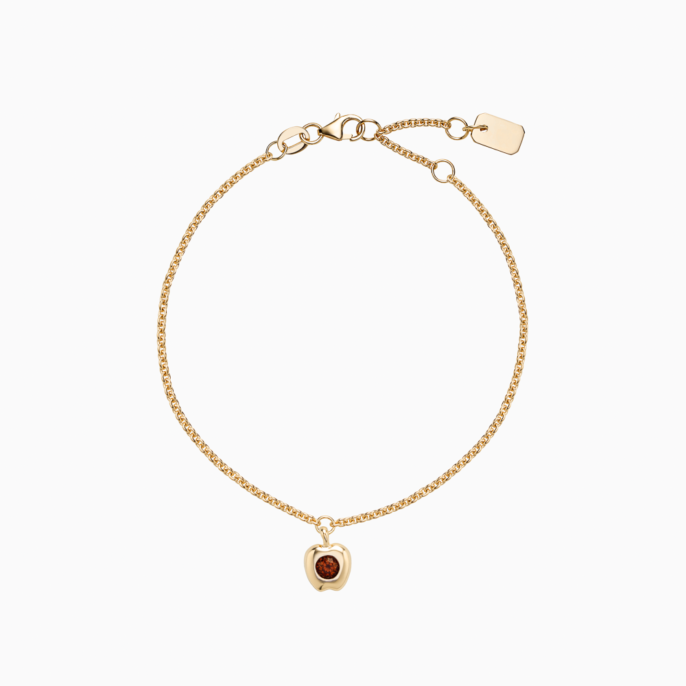 The Ecksand Apple Charm Garnet Bracelet shown with Kid | loops at 4.75", 5.25" and 5.70" in 14k Yellow Gold