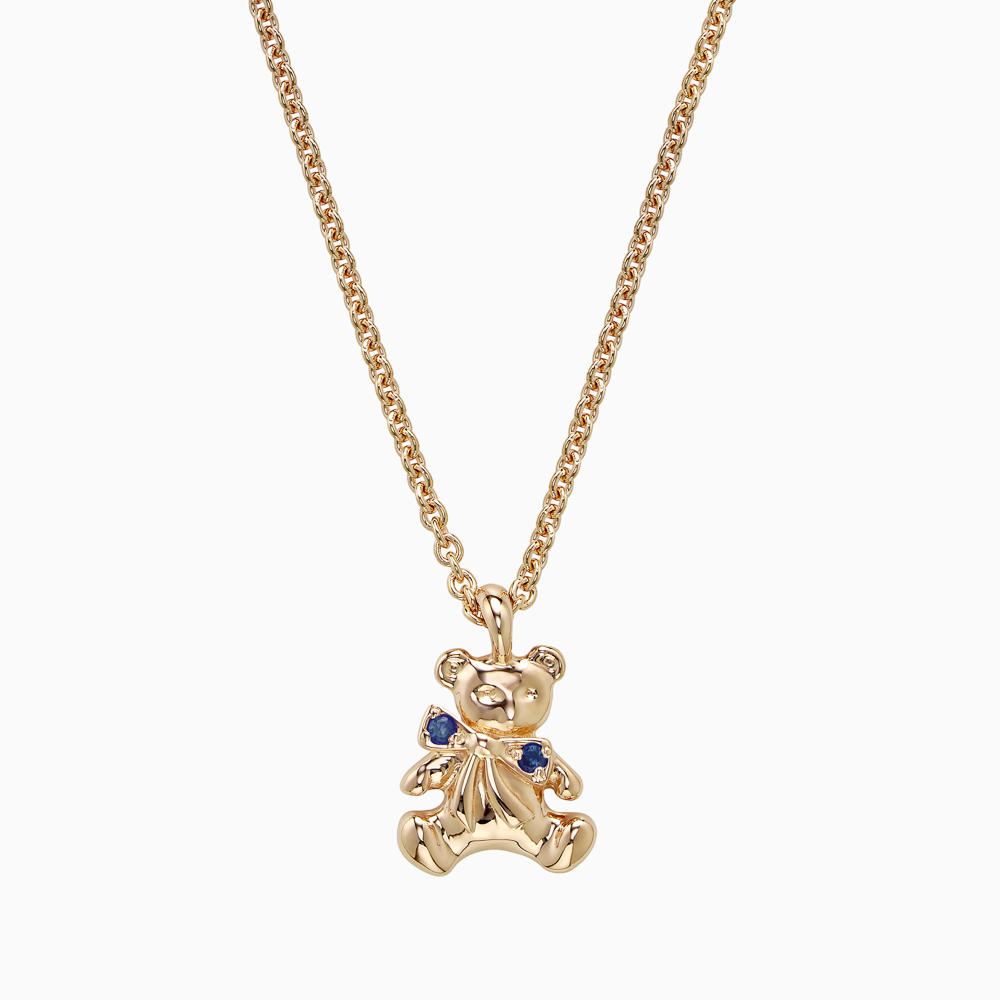 The Ecksand Teddybear Charm Blue Sapphire Pendant Necklace shown with Kid | loops at 14" & 16" in 14k Yellow Gold