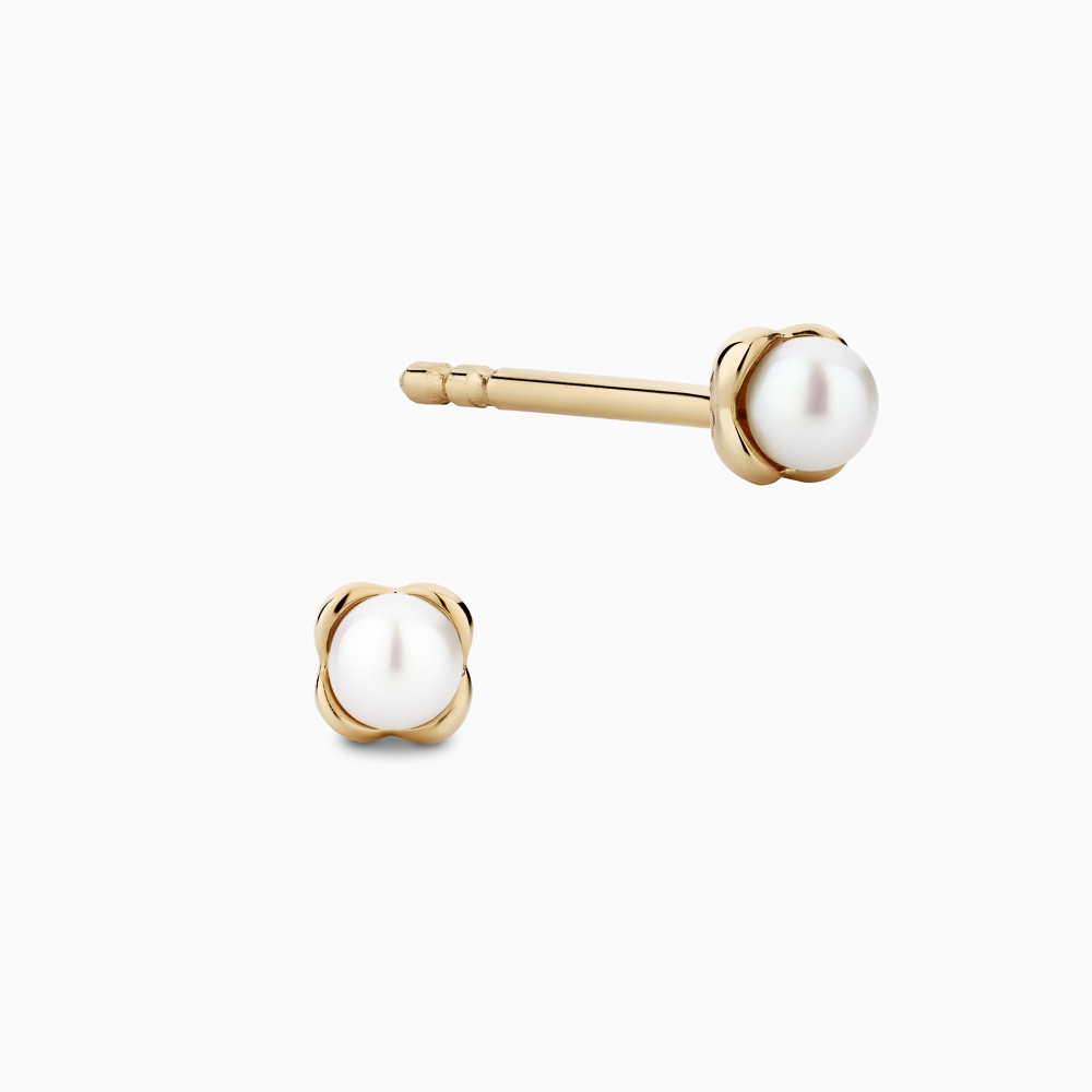 The Ecksand Snowball Freshwater Pearl Earrings shown with Adult | post length 11mm with butterfly push backs in 18k Yellow Gold
