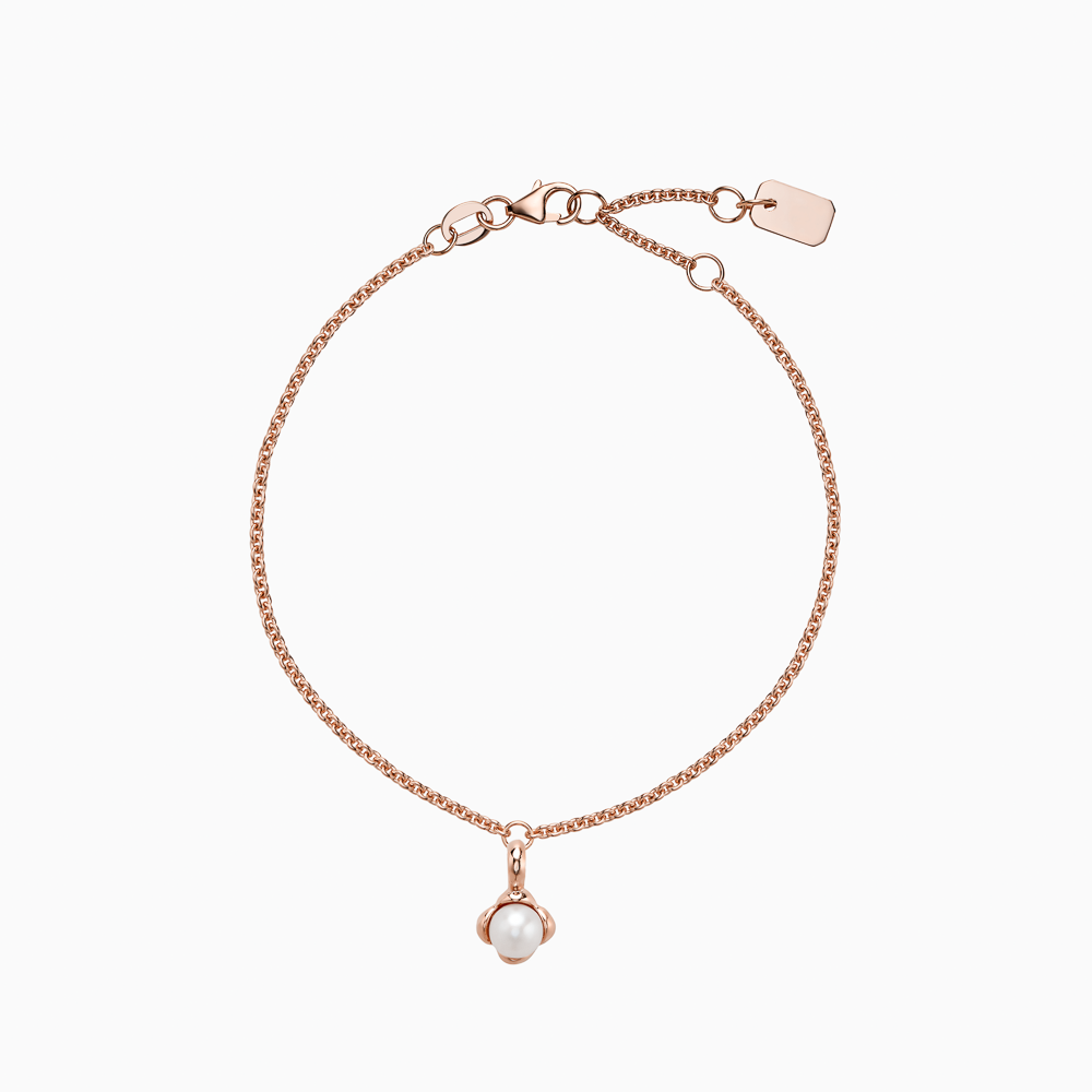 The Ecksand Snowball Charm Freshwater Pearl Bracelet shown with Kid | loops at 4.75", 5.25" and 5.70" in 14k Rose Gold
