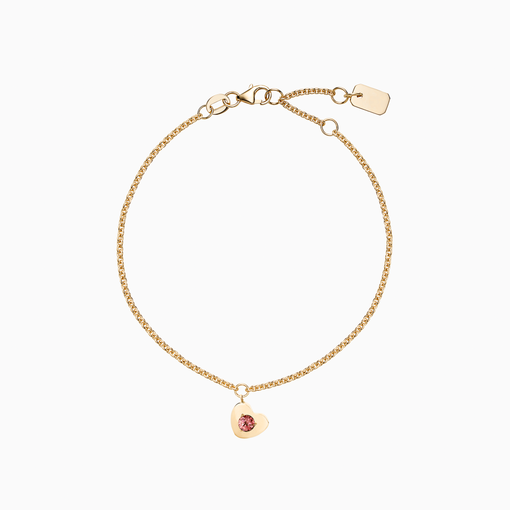 The Ecksand Heart Charm Pink Sapphire Bracelet shown with Kid | loops at 4.75", 5.25" and 5.70" in 14k Yellow Gold