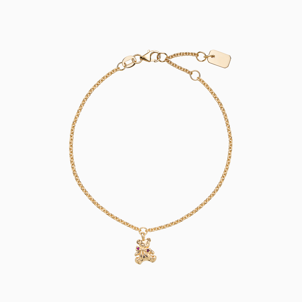 The Ecksand Teddybear Charm Ruby Bracelet shown with Kid | loops at 4.75", 5.25" and 5.70" in 14k Yellow Gold