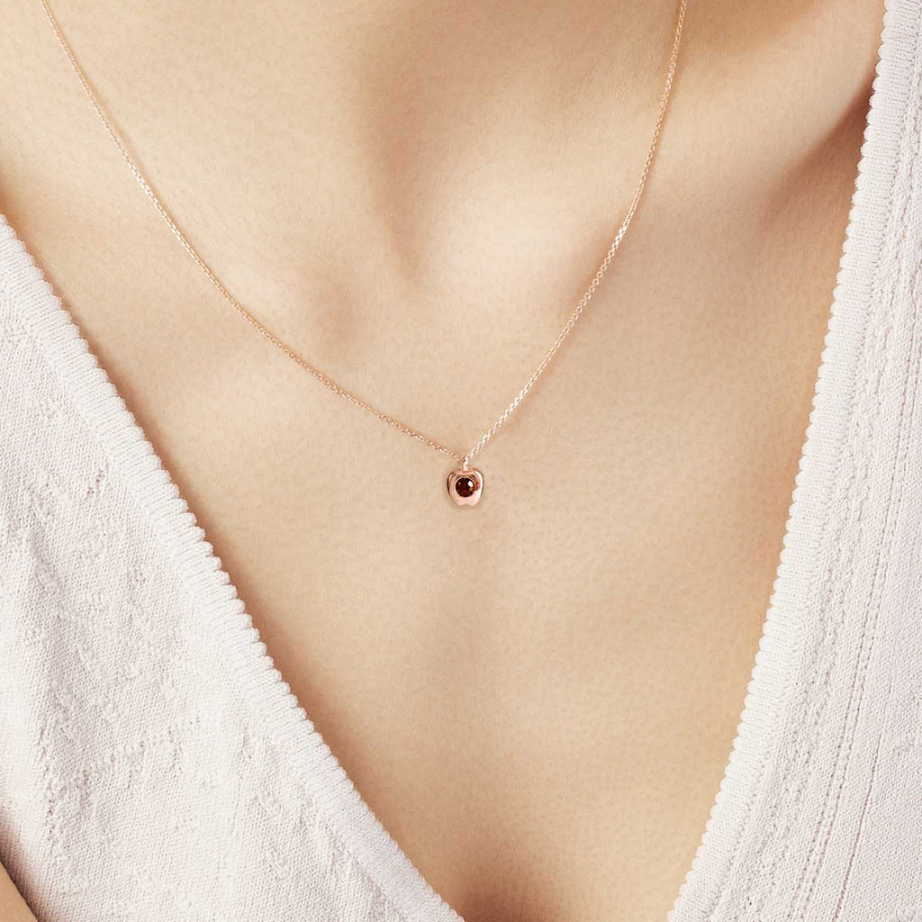 The Ecksand Apple Garnet Pendant Necklace shown with  in 