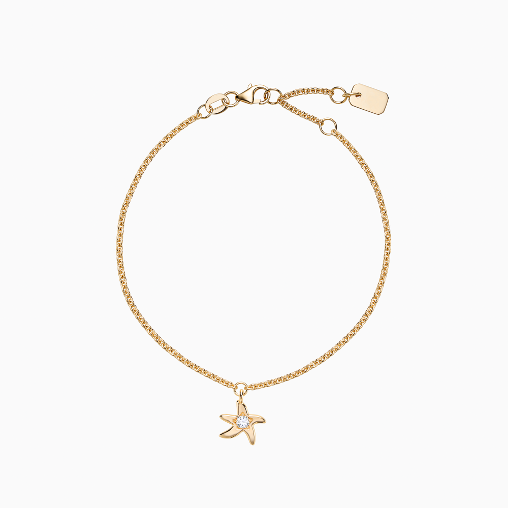 The Ecksand Starfish Charm Diamond Bracelet shown with Natural VS2+/ F+ in 14k Yellow Gold