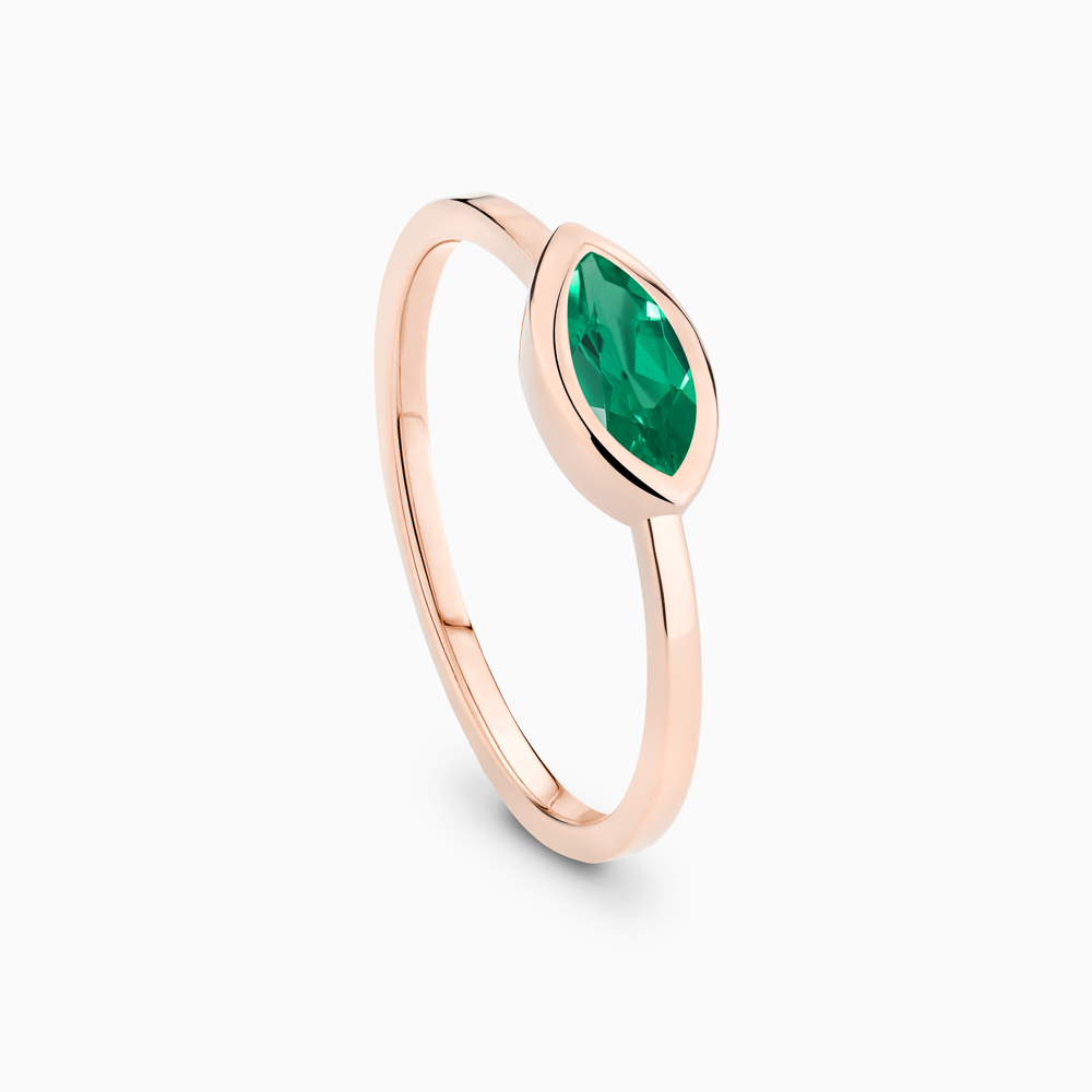 The Ecksand Marquise-Cut Emerald Stackable Ring shown with  in 