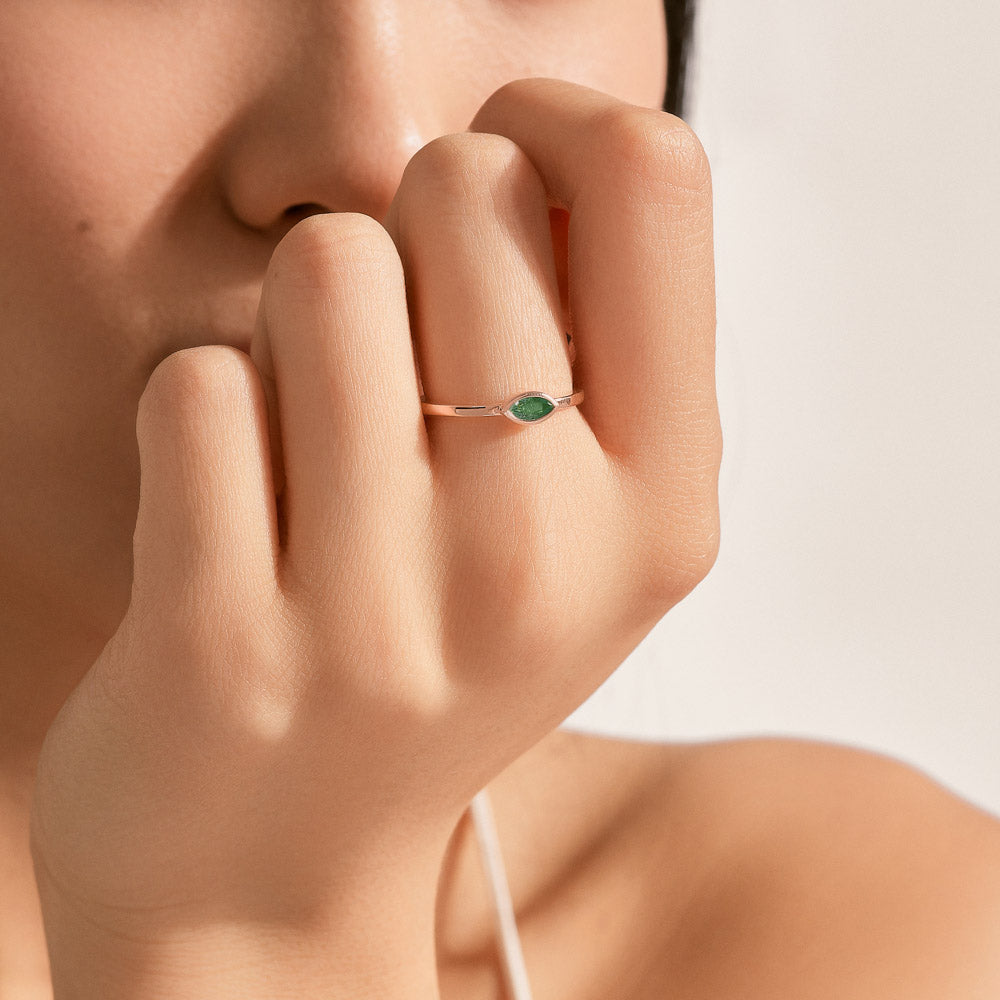 The Ecksand Marquise-Cut Emerald Stackable Ring shown with  in 