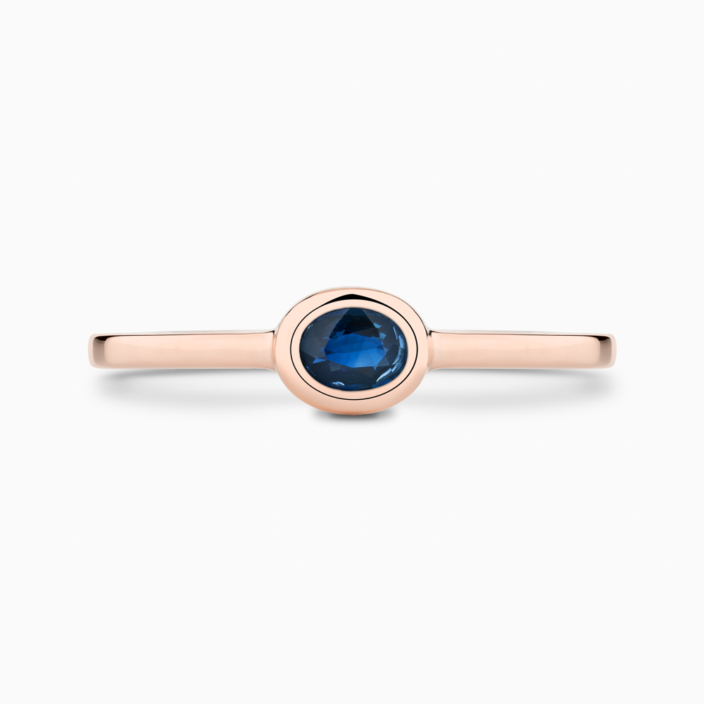 The Ecksand Oval-Cut Blue Sapphire Stackable Ring shown with  in 14k Rose Gold