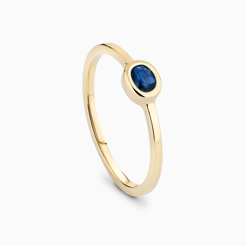 The Ecksand Oval-Cut Blue Sapphire Stackable Ring shown with  in 