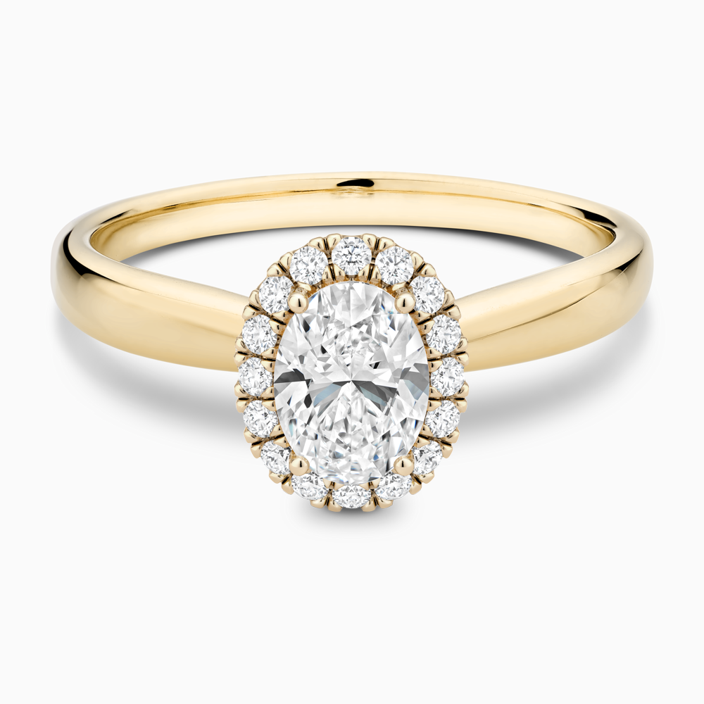 The Ecksand Secret Heart Engagement Ring with Halo shown with Oval in 18k Yellow Gold