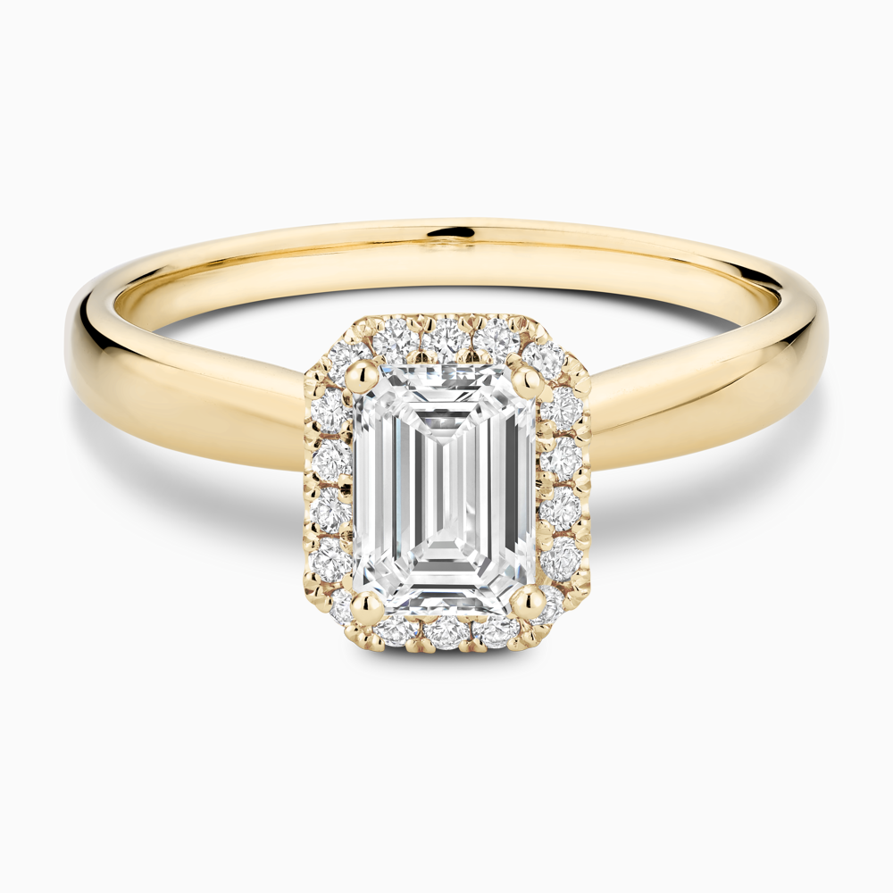 The Ecksand Secret Heart Engagement Ring with Halo shown with Emerald in 18k Yellow Gold