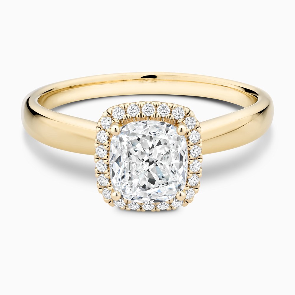 The Ecksand Secret Heart Engagement Ring with Halo shown with Cushion in 18k Yellow Gold