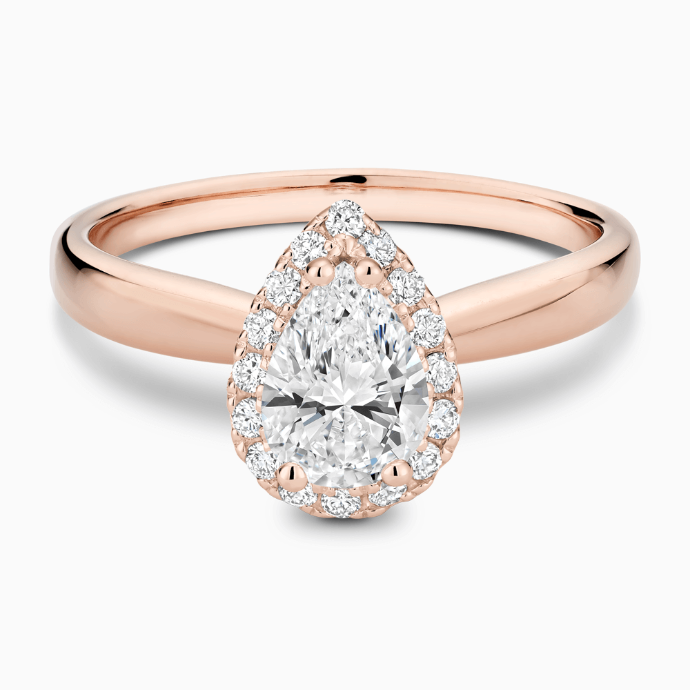 The Ecksand Secret Heart Engagement Ring with Halo shown with Pear in 14k Rose Gold