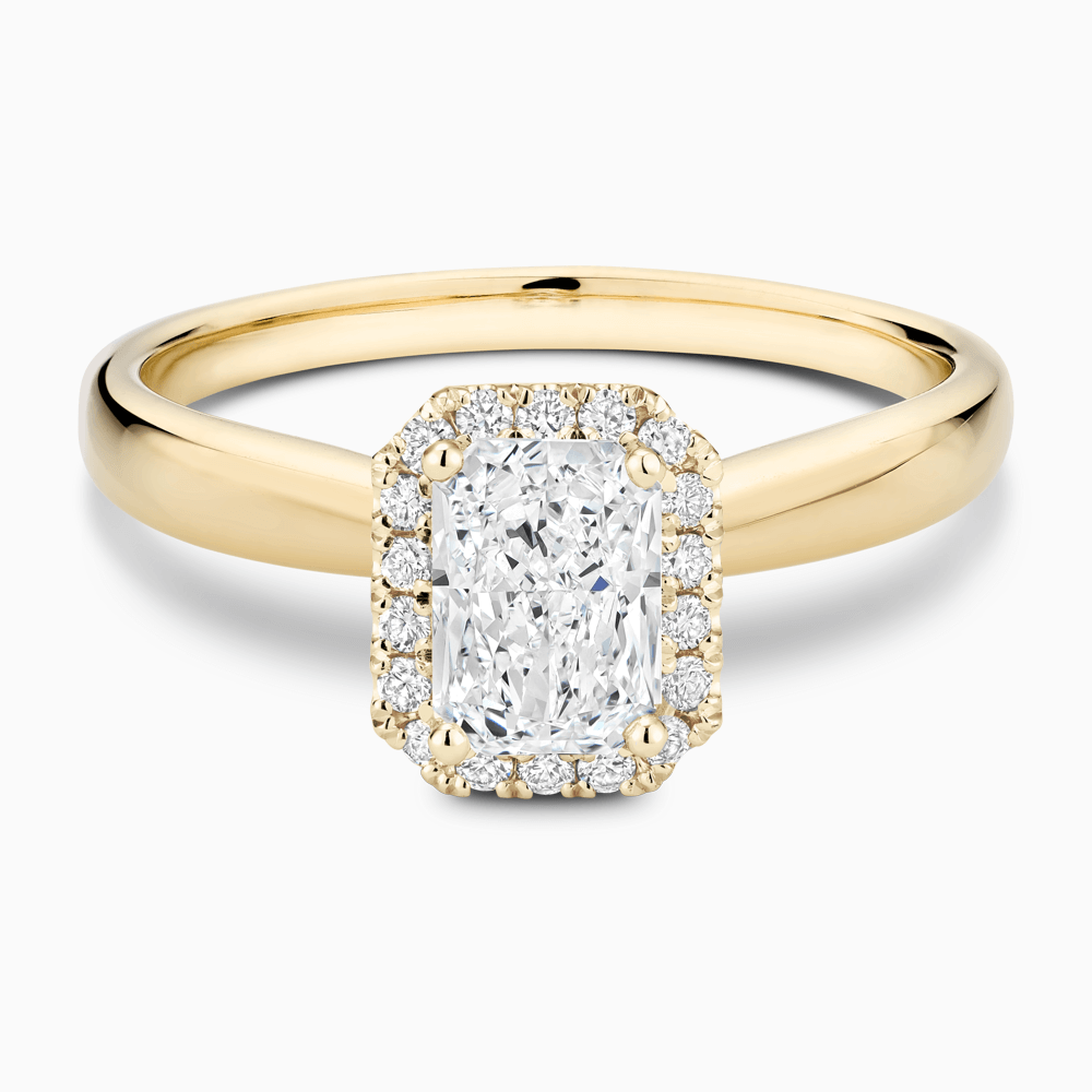 The Ecksand Secret Heart Engagement Ring with Halo shown with Radiant in 18k Yellow Gold