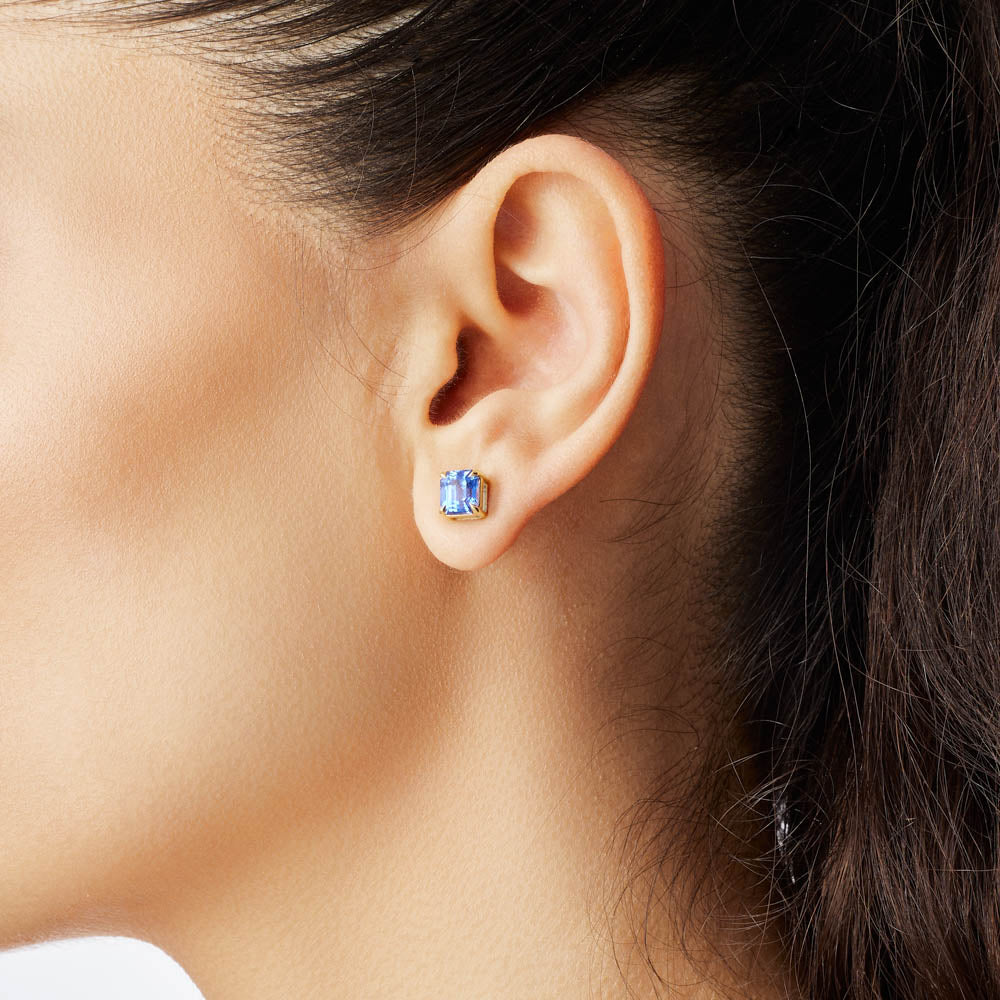 The Ecksand Asscher-Cut Blue Sapphire Stud Earrings shown with  in 