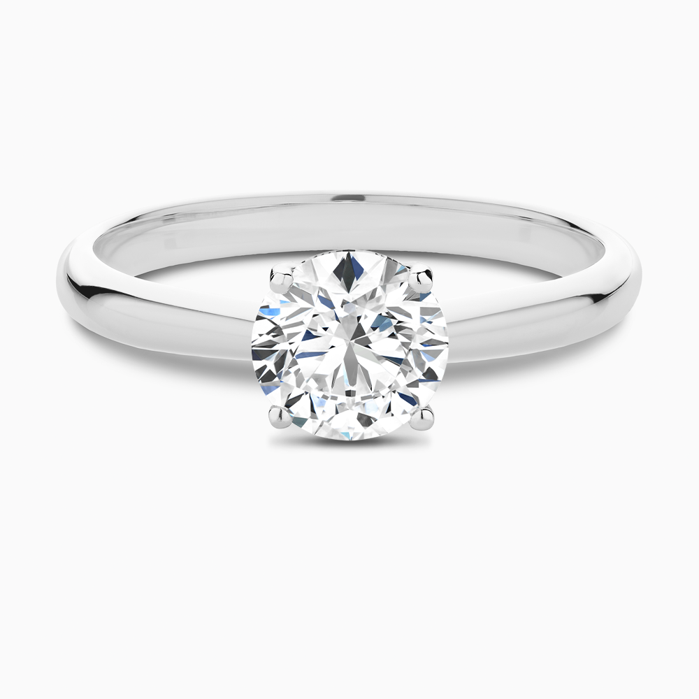 The Ecksand Tapered Diamond Engagement Ring with Basket Setting shown with Round in Platinum