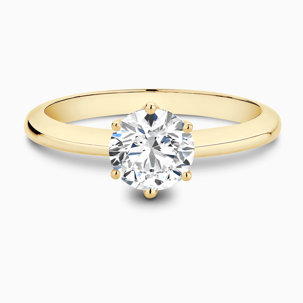 The Ecksand Tapered Diamond Engagement Ring with Six Prongs shown with Round in 18k Yellow Gold