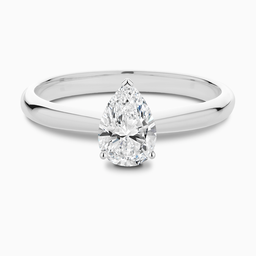 The Ecksand Tapered Diamond Engagement Ring with Basket Setting shown with Pear in Platinum