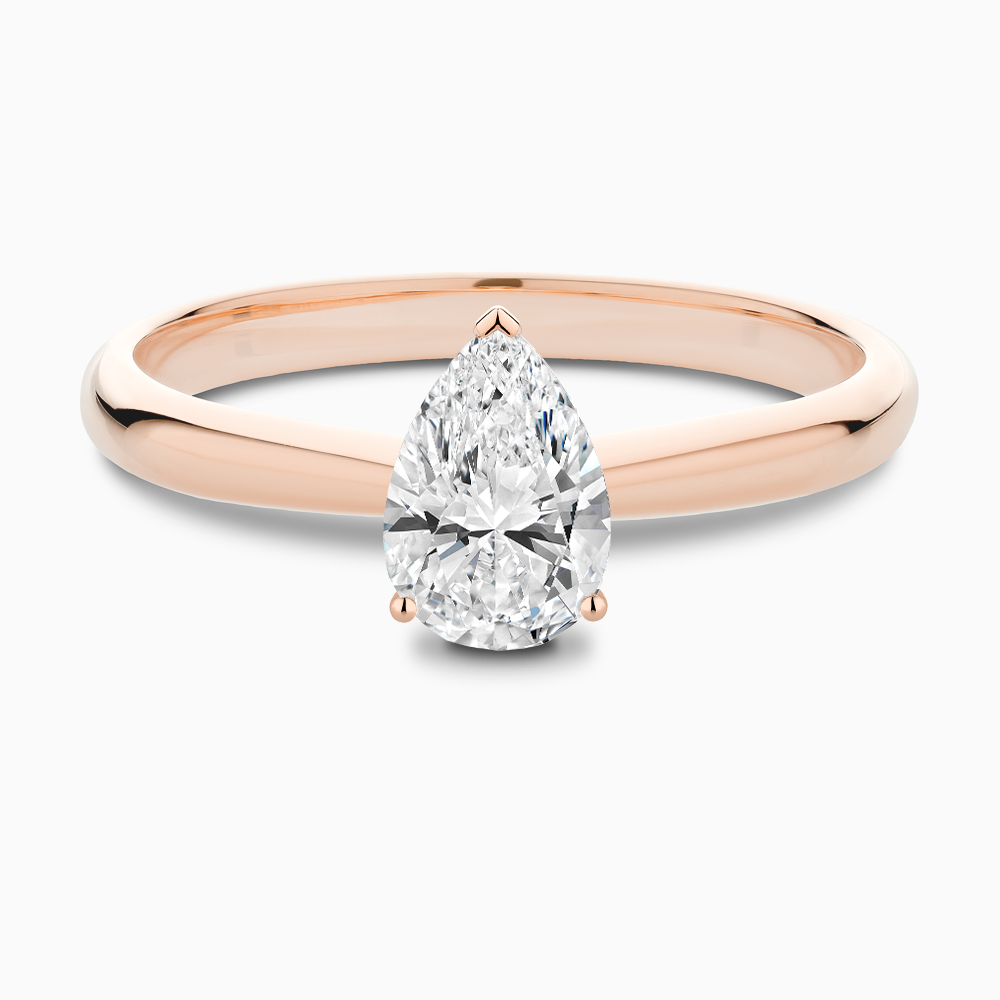 The Ecksand Tapered Diamond Engagement Ring with Basket Setting shown with Pear in 14k Rose Gold