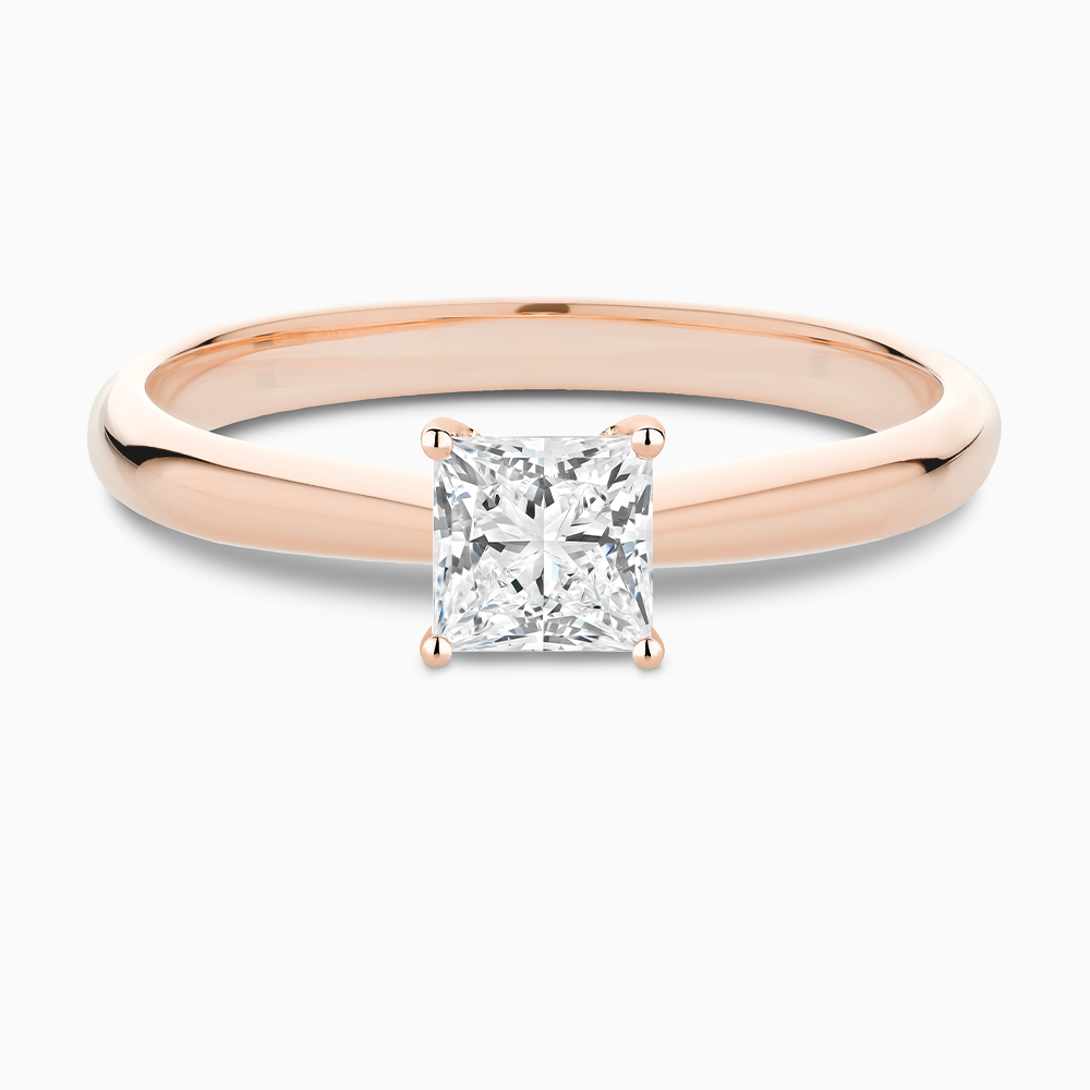 The Ecksand Tapered Diamond Engagement Ring with Basket Setting shown with Princess in 14k Rose Gold