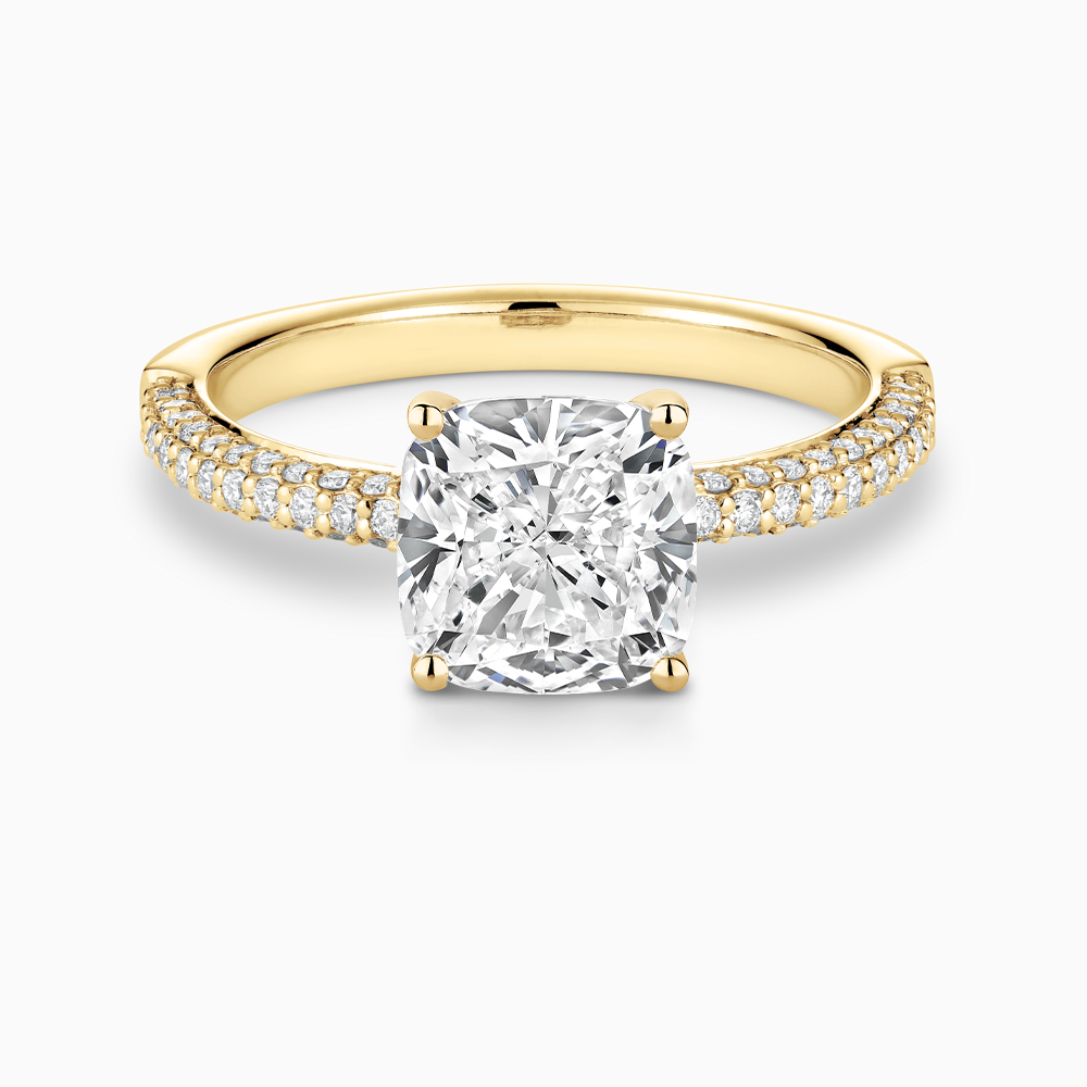 The Ecksand Iconic Diamond Engagement Ring with Micropavé Diamond Band shown with Cushion in 18k Yellow Gold