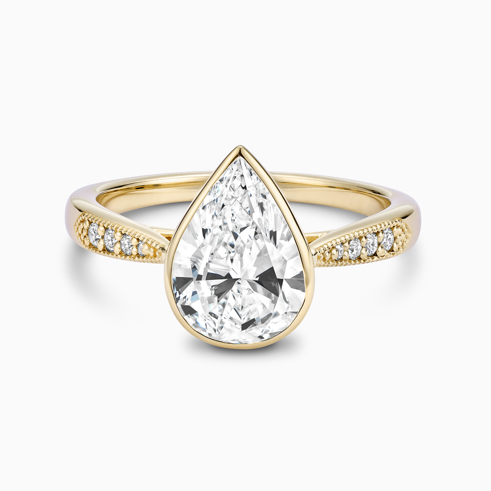 The Ecksand Diamond Engagement Ring With Milgrain Details and Vintage Basket shown with Pear in 18k Yellow Gold