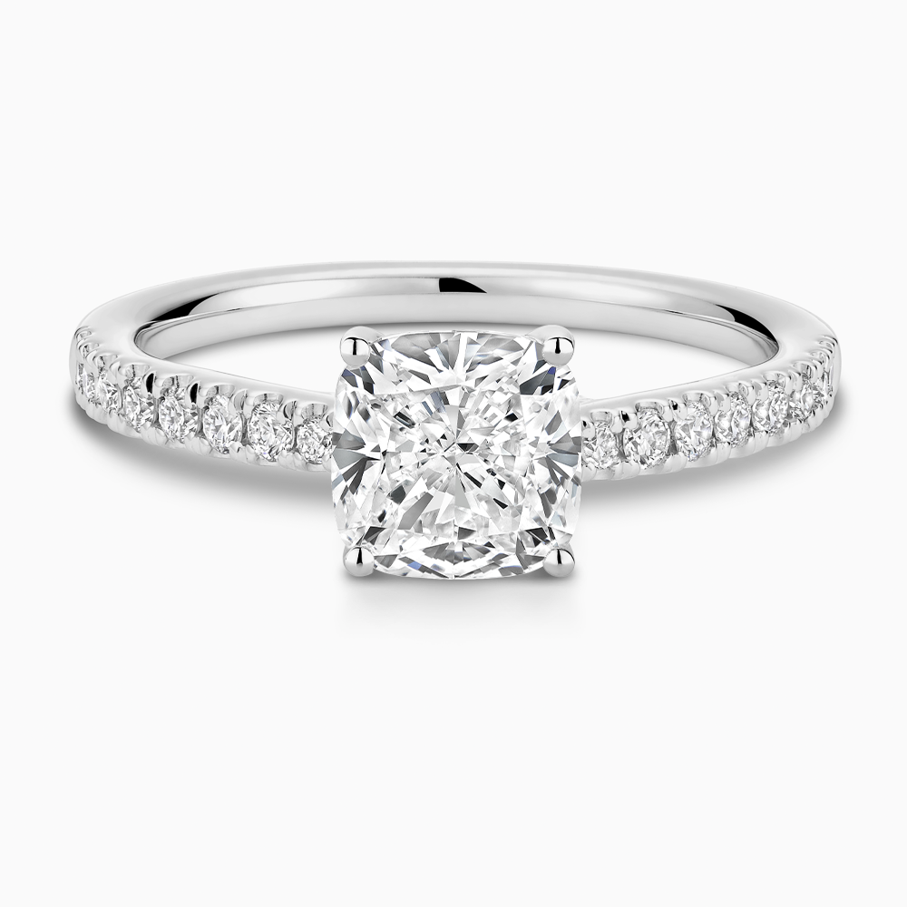 The Ecksand Thick Diamond Engagement Ring with Secret Heart and Diamond Band shown with Cushion in Platinum