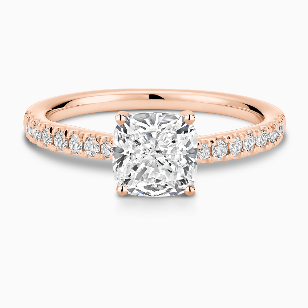 The Ecksand Thick Diamond Engagement Ring with Secret Heart and Diamond Band shown with Cushion in 14k Rose Gold