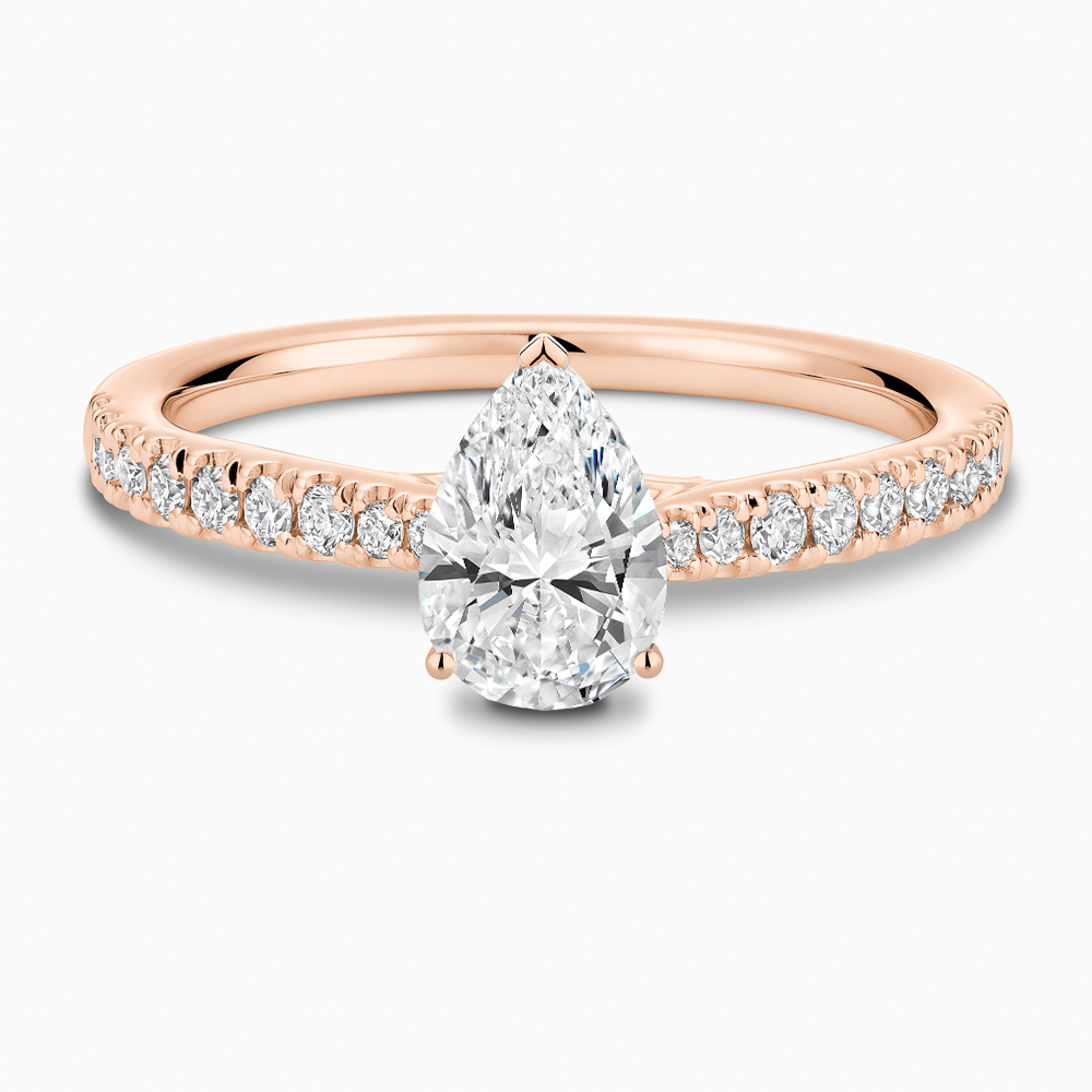 The Ecksand Thick Diamond Engagement Ring with Secret Heart and Diamond Band shown with Pear in 14k Rose Gold