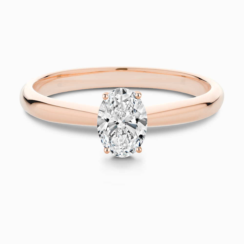 The Ecksand Tapered Diamond Engagement Ring with Basket Setting shown with Oval in 14k Rose Gold