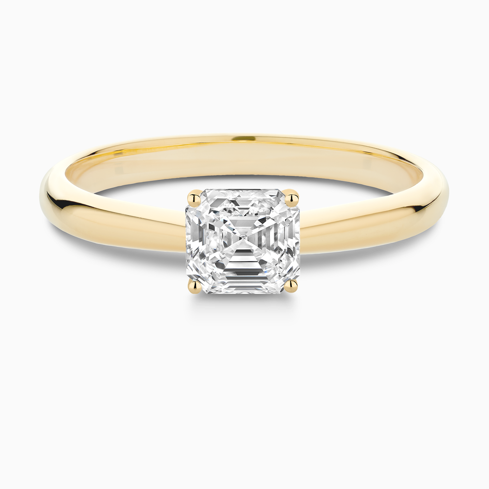 The Ecksand Tapered Diamond Engagement Ring with Basket Setting shown with Asscher in 18k Yellow Gold