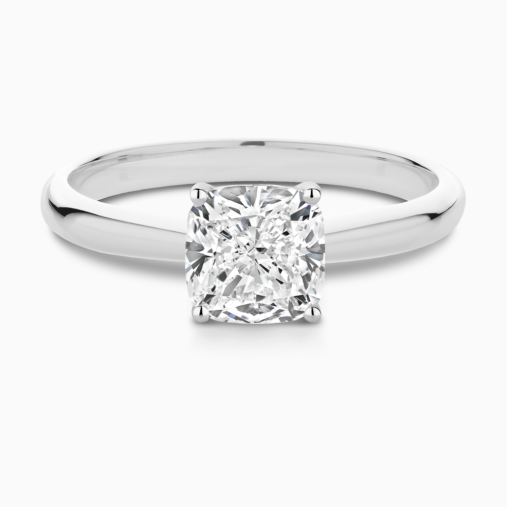 The Ecksand Tapered Diamond Engagement Ring with Basket Setting shown with Cushion in Platinum