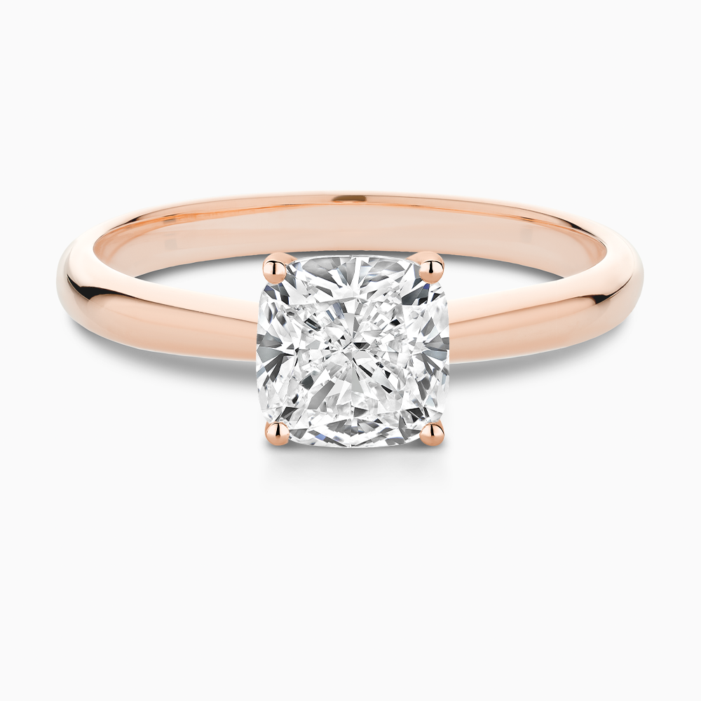 The Ecksand Tapered Diamond Engagement Ring with Basket Setting shown with Cushion in 14k Rose Gold