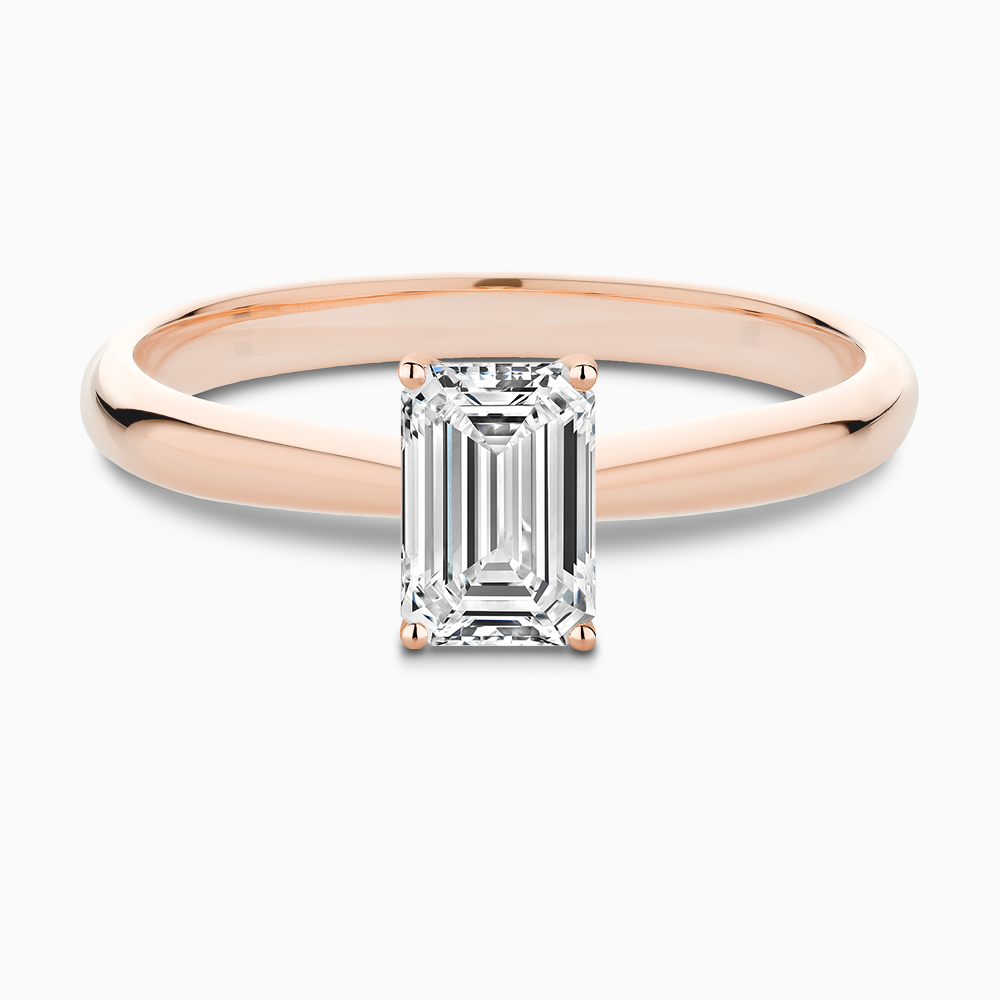 The Ecksand Tapered Diamond Engagement Ring with Basket Setting shown with Emerald in 14k Rose Gold