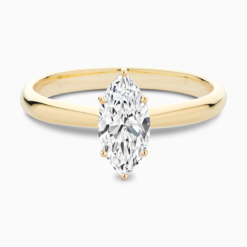 The Ecksand Tapered Diamond Engagement Ring with Basket Setting shown with Marquise in 18k Yellow Gold