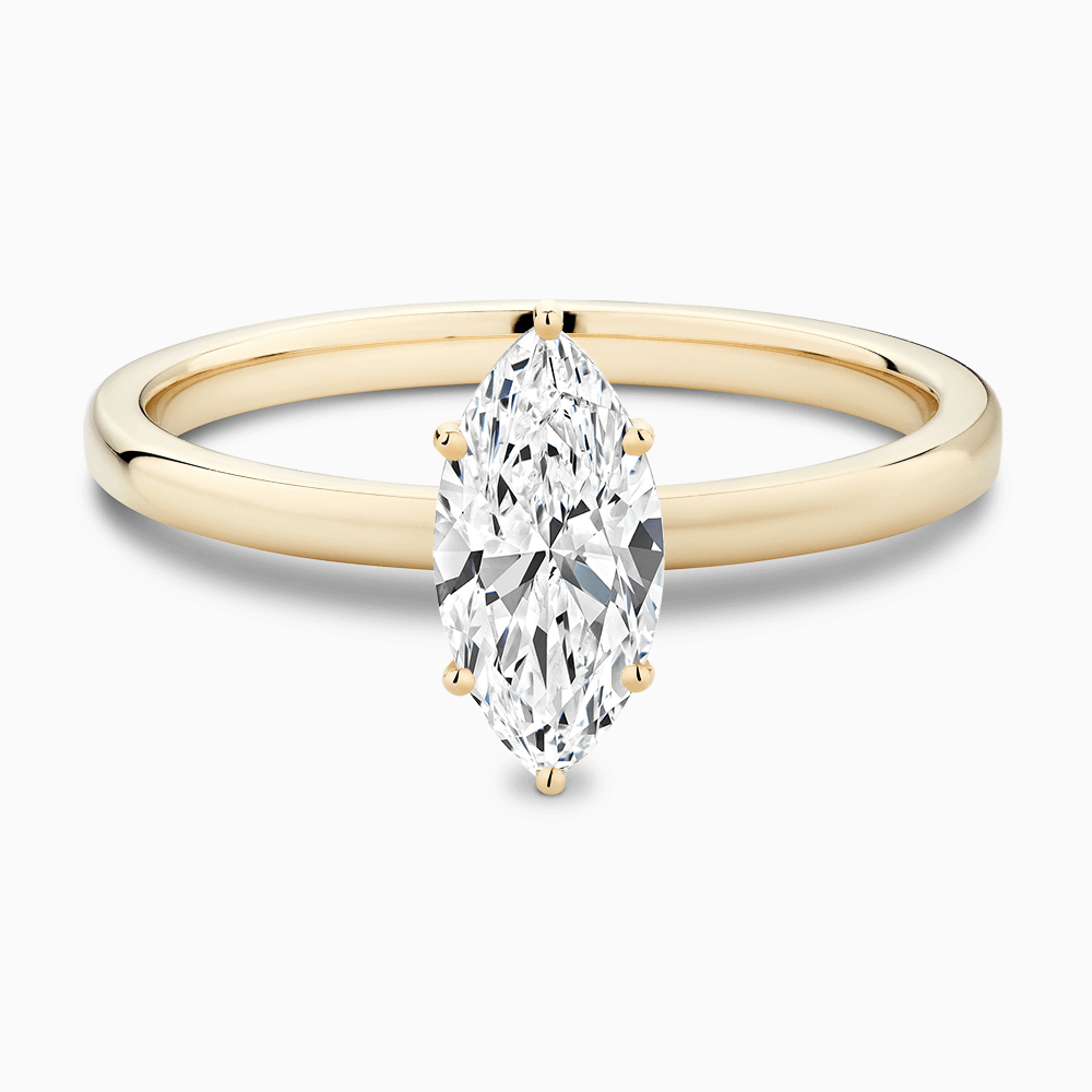 The Ecksand Solitaire Diamond Engagement Ring with Basket Setting shown with Marquise in 18k Yellow Gold