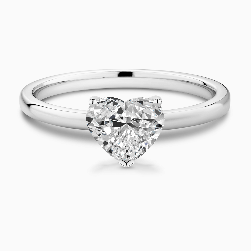 The Ecksand Solitaire Diamond Engagement Ring with Basket Setting shown with Heart in 18k White Gold