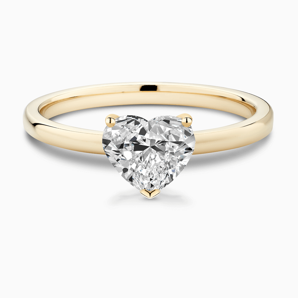 The Ecksand Solitaire Diamond Engagement Ring with Basket Setting shown with Heart in 18k Yellow Gold