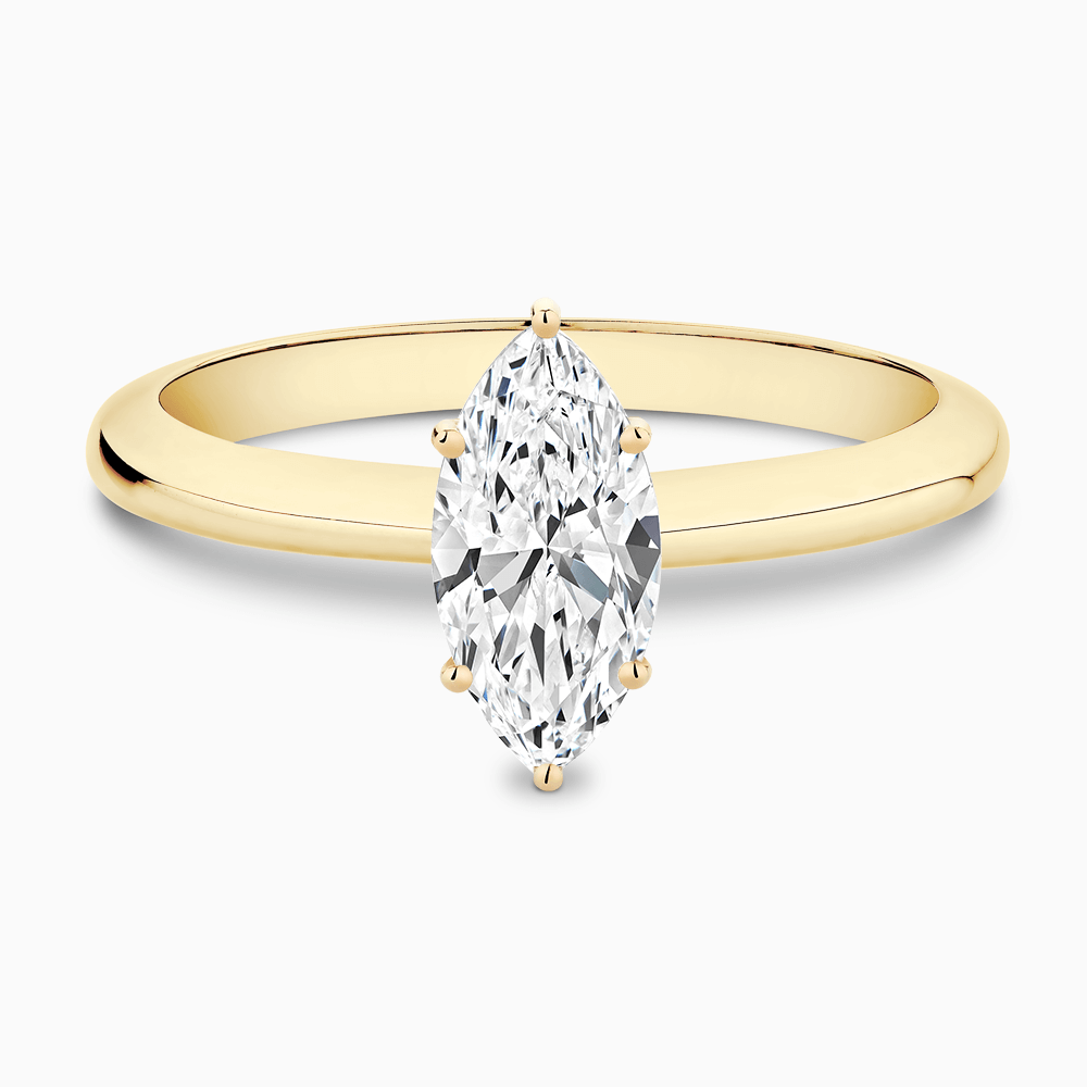The Ecksand Tapered Diamond Engagement Ring with Six Prongs shown with Marquise in 18k Yellow Gold
