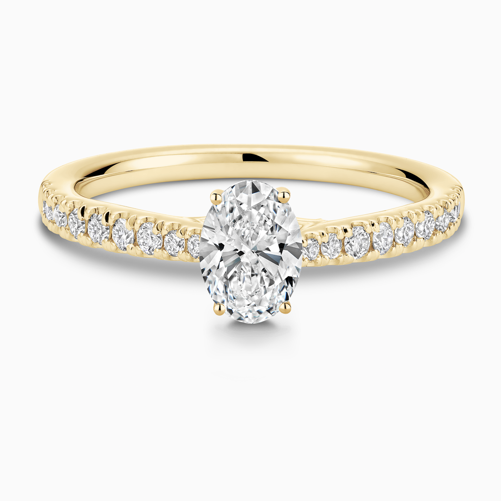 The Ecksand Thick Diamond Engagement Ring with Secret Heart and Diamond Band shown with Oval in 18k Yellow Gold