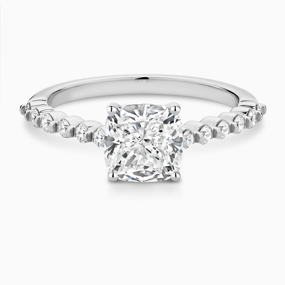The Ecksand Diamond Engagement Ring with Shared Prongs Diamond Pavé shown with Cushion in Platinum