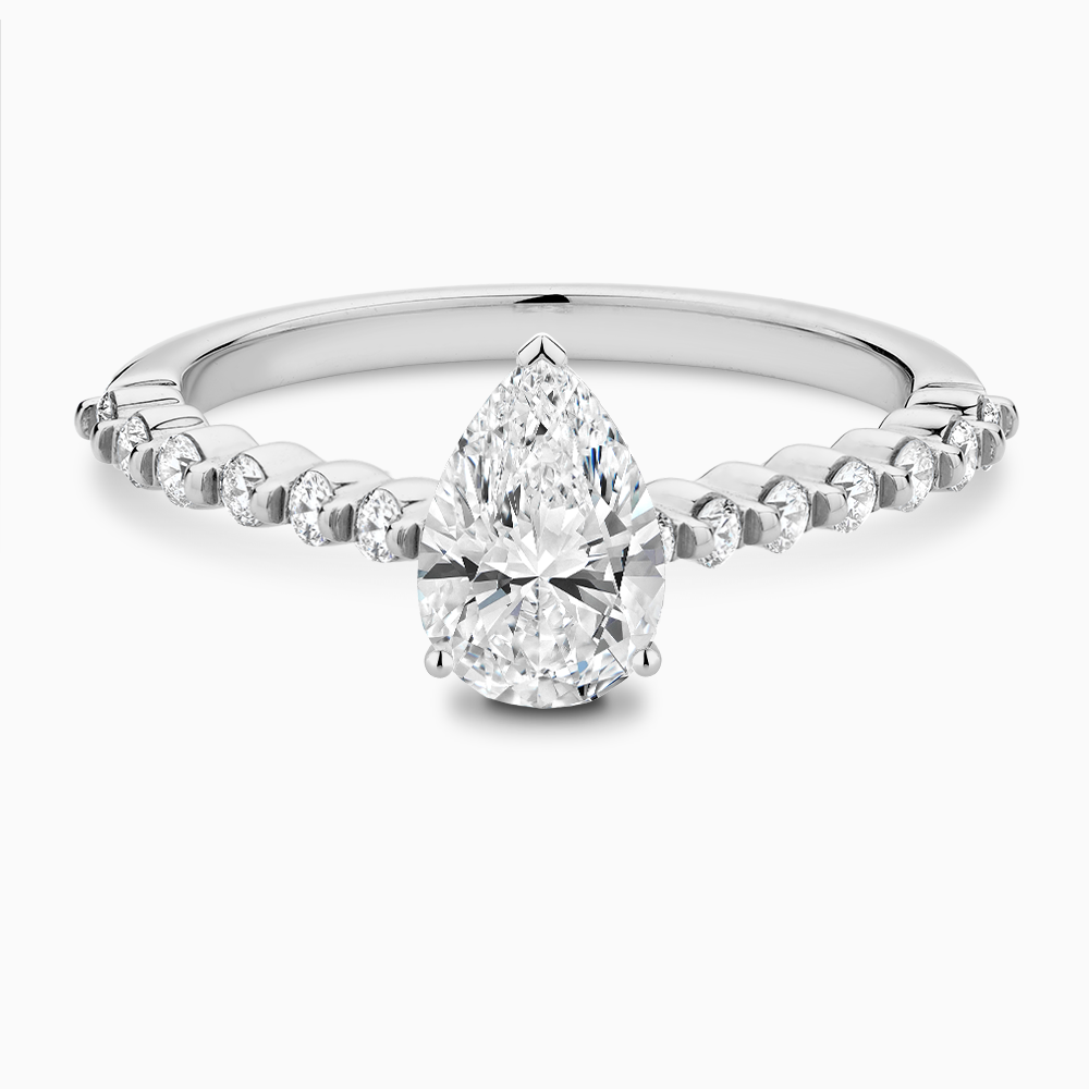 The Ecksand Diamond Engagement Ring with Shared Prongs Diamond Pavé shown with Pear in Platinum