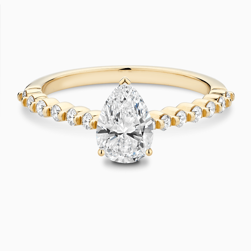 The Ecksand Diamond Engagement Ring with Shared Prongs Diamond Pavé shown with Pear in 18k Yellow Gold